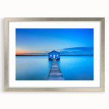 Abstract art print of Perth skyline in muted blue and gray tones on a framed canvas, ideal for dining room decor.