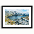 Abstract art print depicting a vibrant, textured landscape of Tasmania on a large canvas, framed in black.