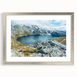 Extra large abstract art print depicting a textured Tasmanian landscape, in muted earth tones, framed in silver.