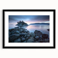 Abstract art print depicting a textured, colorful landscape of British Columbia, in a large black frame.