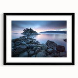 Abstract art print depicting a textured, colorful landscape of British Columbia, in a large black frame.