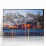 Mid-century modernist art depicting Nova Scotia scenery in muted green and blue tones on a silver-framed acrylic print.