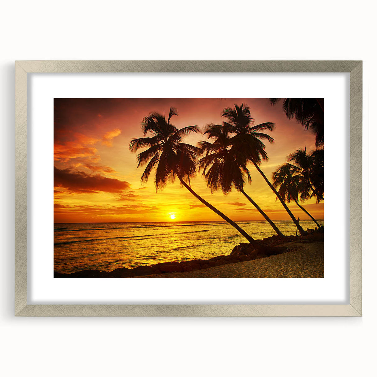 Abstract art print depicting a serene Caribbean scene in cool blue and green tones, framed in silver.