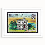 Textured abstract art print of Caribbean scenery in muted blue and green tones, framed with a white mat.