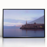 Large abstract wall art depicting a Caribbean scenery in muted blue and green tones on framed acrylic.