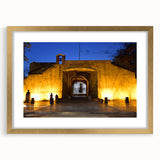 Abstract art print of Caribbean scenery in gold frame, with vibrant blue and green tones, ideal for dining room decor.