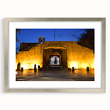 Extra large wall art featuring an abstract Caribbean scenery in textured blues and greens, framed in silver.