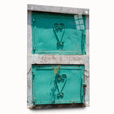Large abstract wall art depicting a Caribbean scenery in vibrant blue and green tones on acrylic glass.