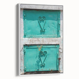 Framed canvas featuring a vintage-style landscape painting of a Caribbean scene in vibrant, colorful tones.