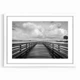 Textured art of an abstract Caribbean scenery in muted blue and green hues, framed with a white mat.
