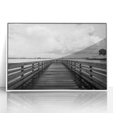 Mid-century modernist art depicting a Caribbean scenery in vibrant colors, framed in white acrylic.