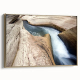 Framed canvas of a Caribbean landscape with lush greenery and ocean view in muted green and blue tones.