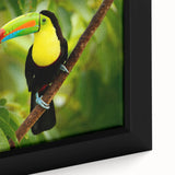 Close-up of textured black wall art featuring a vibrant, colorful Belize scenery on a framed canvas.
