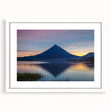 Abstract art print of a Costa Rican landscape in muted green and blue tones, framed with a white mat.