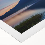 Art deco poster of a Costa Rican landscape on rolled canvas, featuring muted green and blue tones.