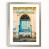 Textured abstract art print depicting a Central American scenery in muted earth tones, framed in silver.