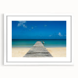 Abstract art print of a Central American landscape in muted greens and blues on a framed white mat.