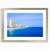 Extra large abstract art print depicting a textured scenery of Central America, in muted earth tones, framed in silver.