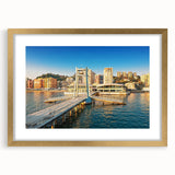 Abstract art print of a European scenery in muted earth tones on a framed canvas, ideal for dining room decor.