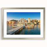 Extra large abstract art print depicting a textured European scenery in muted earth tones, framed in silver.