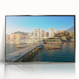 Large art print of a European Albanian landscape in muted greens and blues on a silver-framed acrylic.