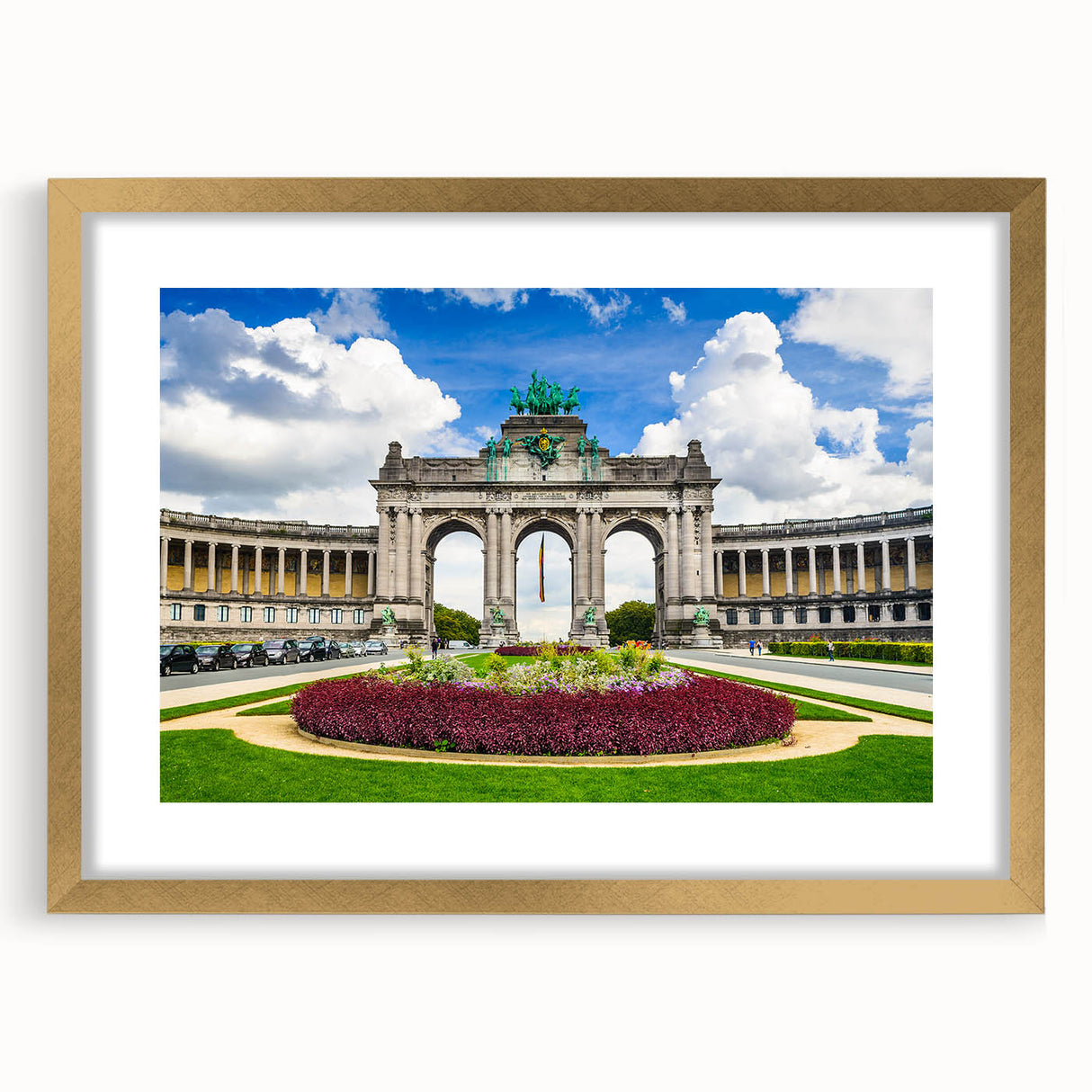 Abstract art print of a European cityscape in muted gold and blue, framed with a gold mat, suitable for dining room decor.