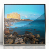 Large art print of a European Cyprus landscape in muted earth tones, framed in silver acrylic.