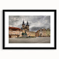 Colorful abstract art print of Prague scenery, in a black frame with mat, ideal for living room decor.