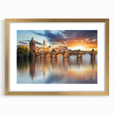 Abstract art print of a Czech Republic scenery in muted earth tones, framed in gold, suitable for dining room decor.