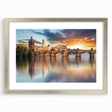 Extra large abstract art print featuring a textured depiction of a European cityscape in muted earth tones, framed in silver.