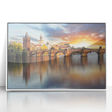 Mid-century modernist art depicting a European cityscape in muted gray and blue tones on a framed acrylic print.