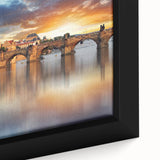 Framed canvas of a textured Prague skyline with a black background and vibrant, colorful highlights.