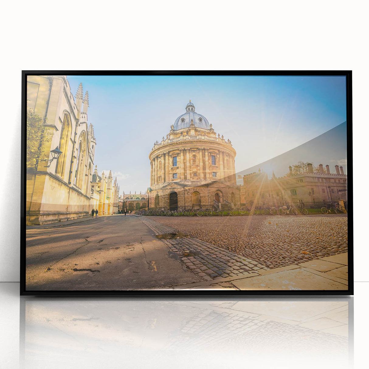 Large abstract wall art of Oxford scenery in muted earth tones on acrylic, framed in black, suitable for living room decor.