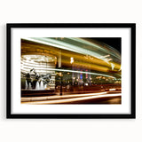 Extra large abstract art print of Piccadilly, England, featuring vibrant, colorful textures on a framed black mat.