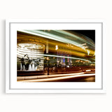 Textured art print of Piccadilly, England in abstract style with muted colors on a framed white mat.