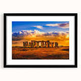 Extra large abstract art print of Stonehenge in vibrant colors, framed in black, ideal for living room decor.