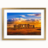 Abstract art print of Stonehenge in muted earth tones on a framed canvas, suitable for bedroom or dining room decor.