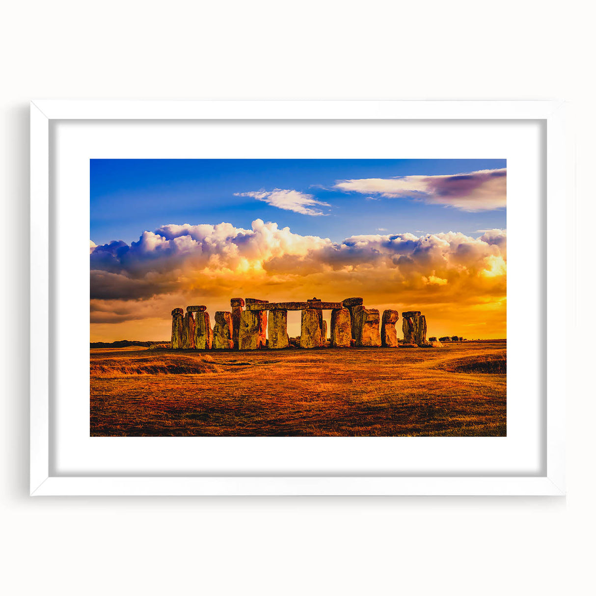 Textured art print of Stonehenge in muted earth tones on a white framed mat, ideal for bedroom wall decor.