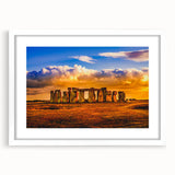 Textured art print of Stonehenge in muted earth tones on a white framed mat, ideal for bedroom wall decor.