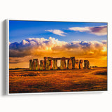 Vintage poster art of Stonehenge on a white framed canvas, ideal for living room decor.