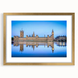 Abstract art print of the Thames River in muted gray and blue tones, framed with a gold mat, suitable for dining room decor.