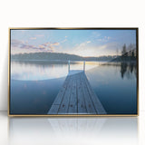 Acrylic print of a serene Finnish landscape in muted greens and blues, framed in gold, suitable for nursery wall art.