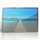 Large art print of Corsican landscape in muted green and blue tones, framed in silver acrylic.