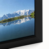 Black wall art of the French Alps on a framed canvas, featuring textured.