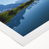 Art deco poster of the French Alps in muted blues and grays on rolled canvas, suitable for dining room wall art.