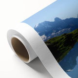 Art deco poster of the French Alps in muted blue and white tones on rolled canvas, ideal for nursery wall art.