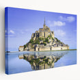Large art print of a serene French countryside landscape on stretched canvas, featuring soft green and blue tones.