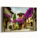 Framed canvas of a vintage-style landscape painting depicting the Nice, France coastline in muted gold and black tones.