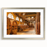 Extra large abstract art print depicting a textured Normandy scenery in muted earth tones on a silver-framed canvas.