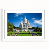 Textured art of abstract Paris scene in muted gray and blue tones on a framed white mat, suitable for bedroom decor.